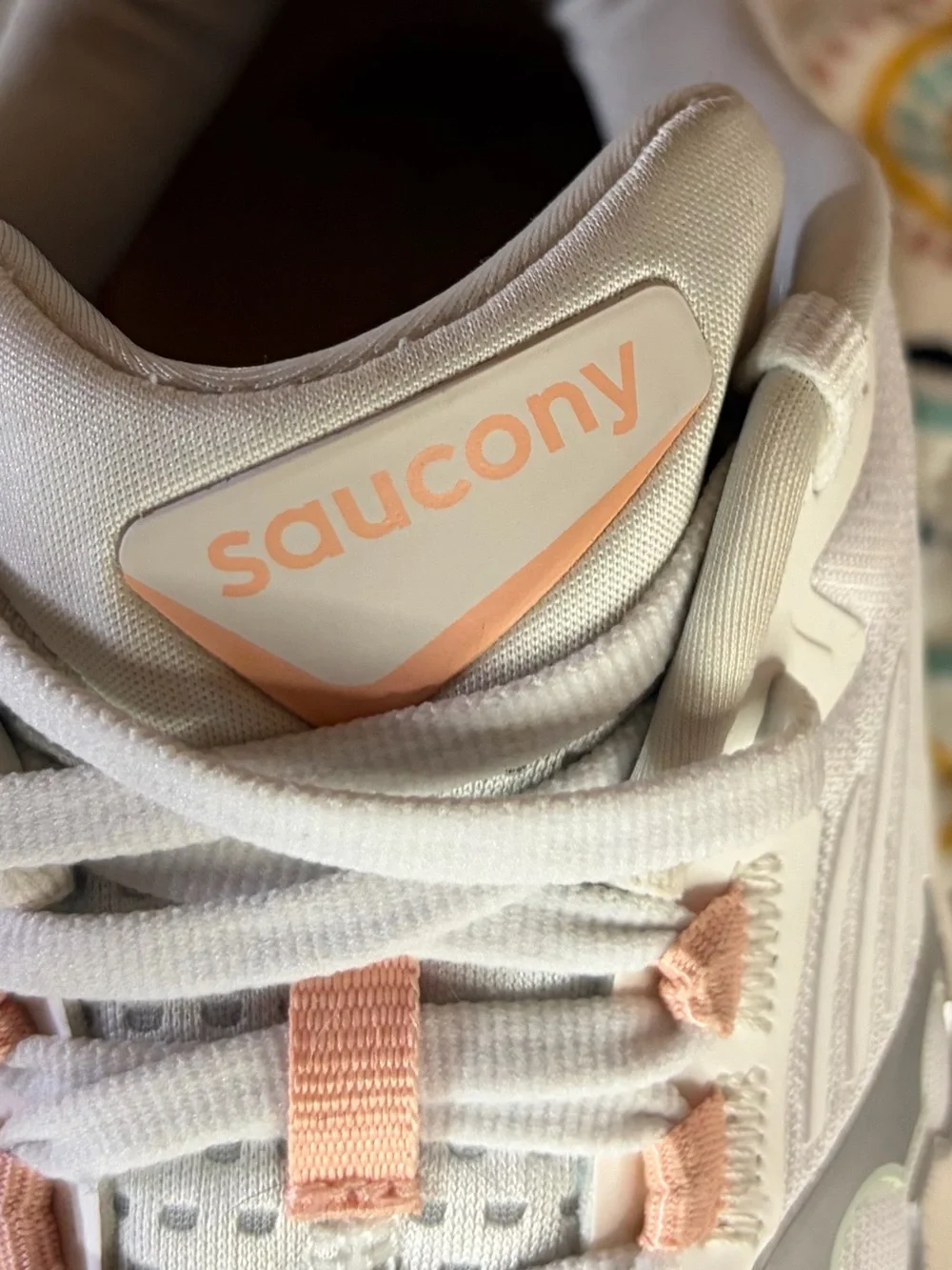 Saucony Women's White Athletic Running Shoes with Pink Accents